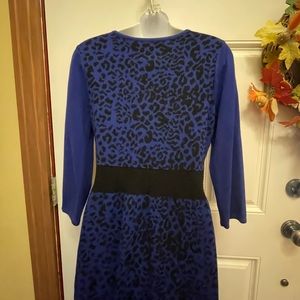 Spense Medium Midi Length knit Dress  in a black and royal Blue print.